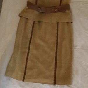 Silk skirt and top with leather trim.